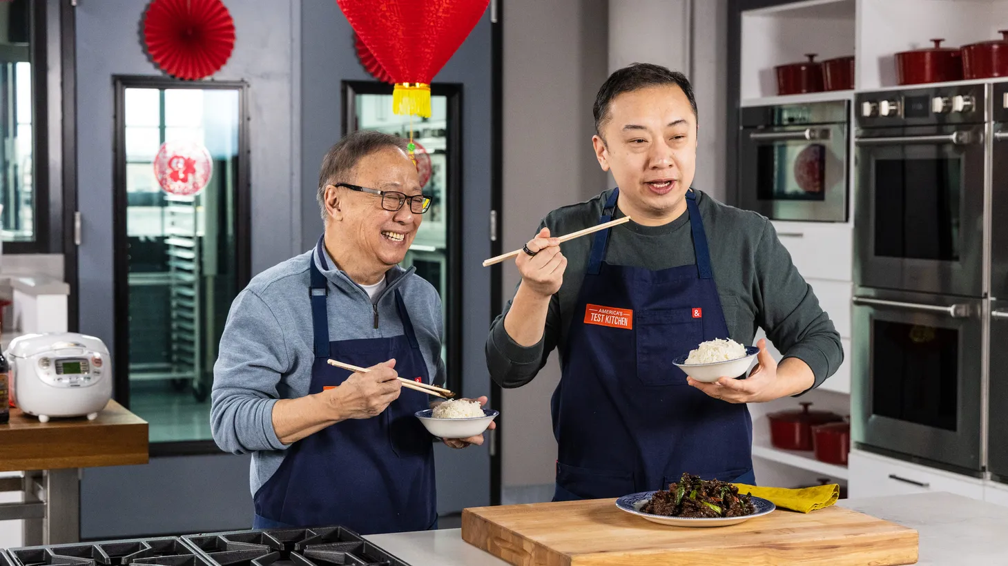 Jeffrey Pang (left) and his son, Kevin, make Cantonese family recipes in their YouTube series, "Hunger Pangs."