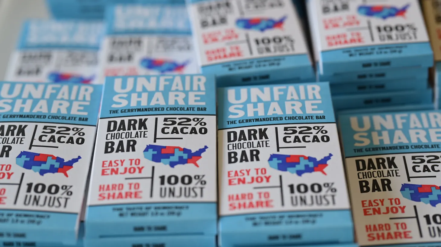 Artist and printer Ben Blount designed the packaging for Unfair Share, the Gerrymandered Chocolate Bar.