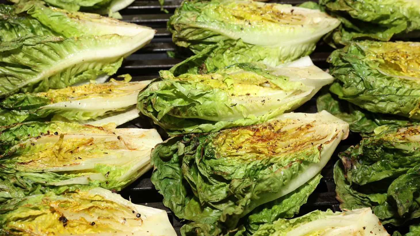 Grilling romaine lettuce adds a twist to the classic Caesar salad.