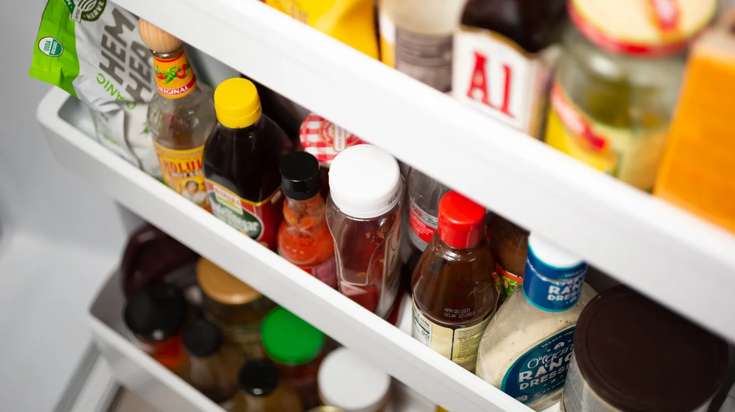 Is It Really Safe To Store Salad Dressing In The Refrigerator Door?