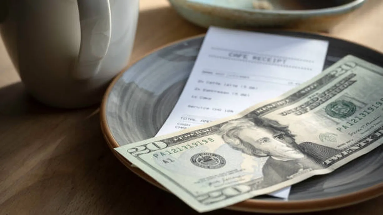 As of July 1, service charges will be banned from restaurant checks in California.