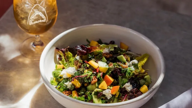 Chef Juan Ferriero creates inspired salads for his menu at Great White.