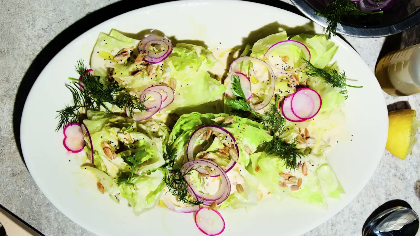 Andy Baraghani's take on a wedge salad features a garlicky tahini-based ranch instead of a blue cheese dressing.