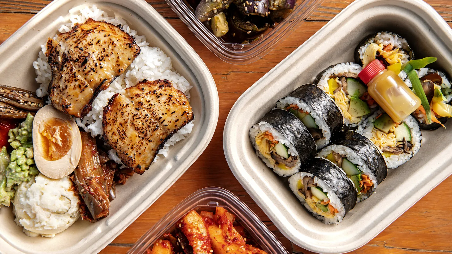 Cod (left) is served with market-inspired banchan for the perfectly portioned dosirak at Perilla. With the lunch, “you get a taste of what she’s up to,” says Bill Addison.