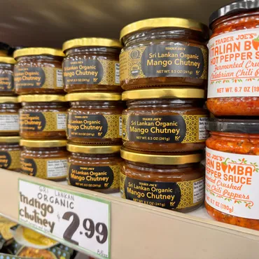 Adam Reiner takes a closer look at the products behind the tongue-in-cheek labels on the shelves of Trader Joe's.