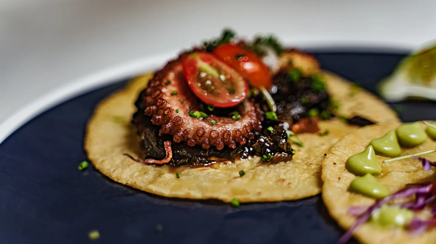 The pulpo en su tinta taco at Holbox takes the second place spot on LA Taco's list of the city's best tacos.