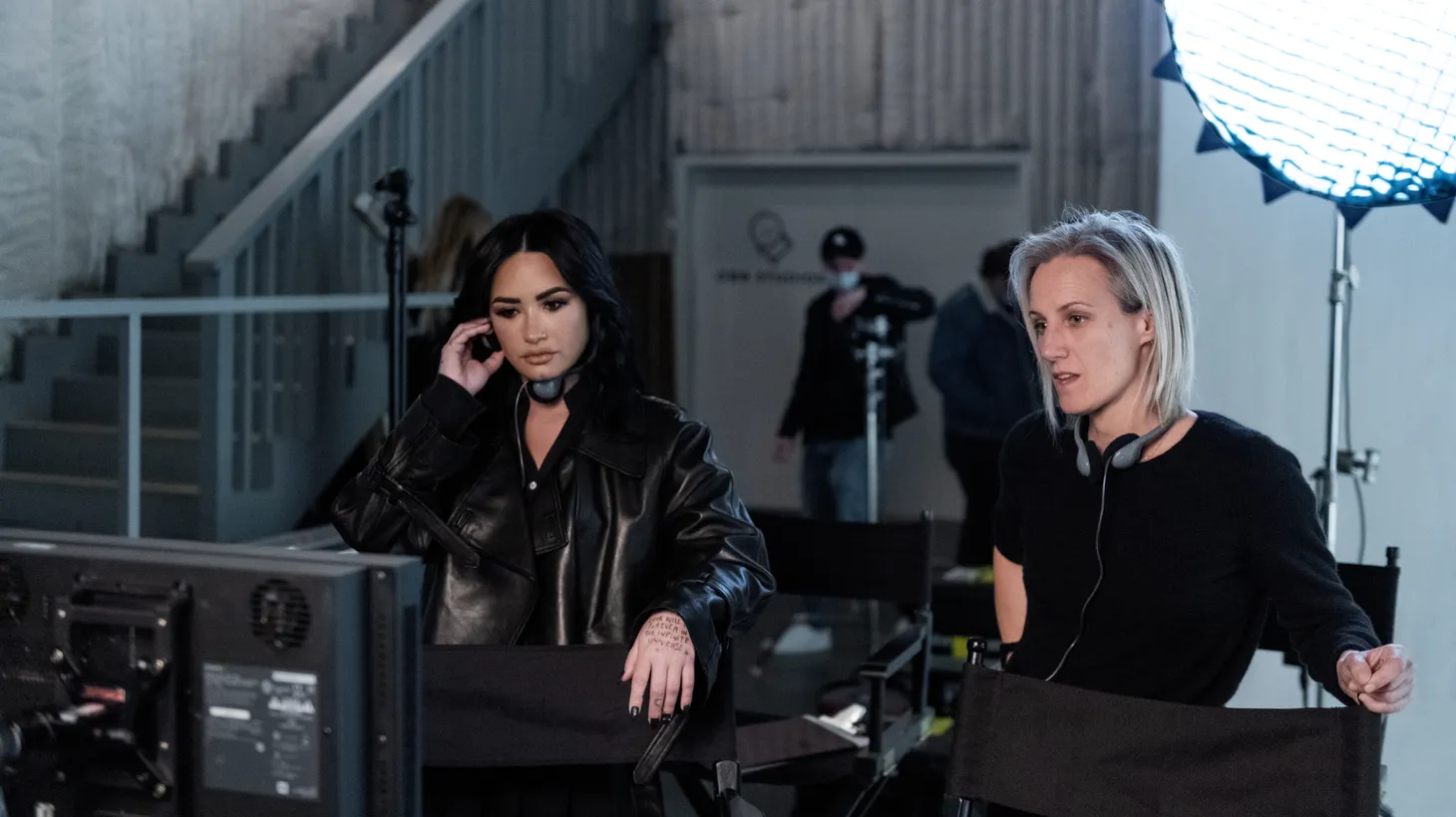 (L to R) Demi Lovato and Nicola Marsh get to work.