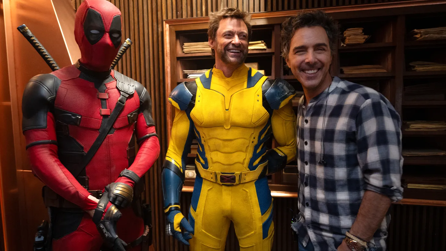 (L-R): Ryan Reynolds, Hugh Jackman, and Director Shawn Levy on the set of Marvel Studios' DEADPOOL & WOLVERINE.