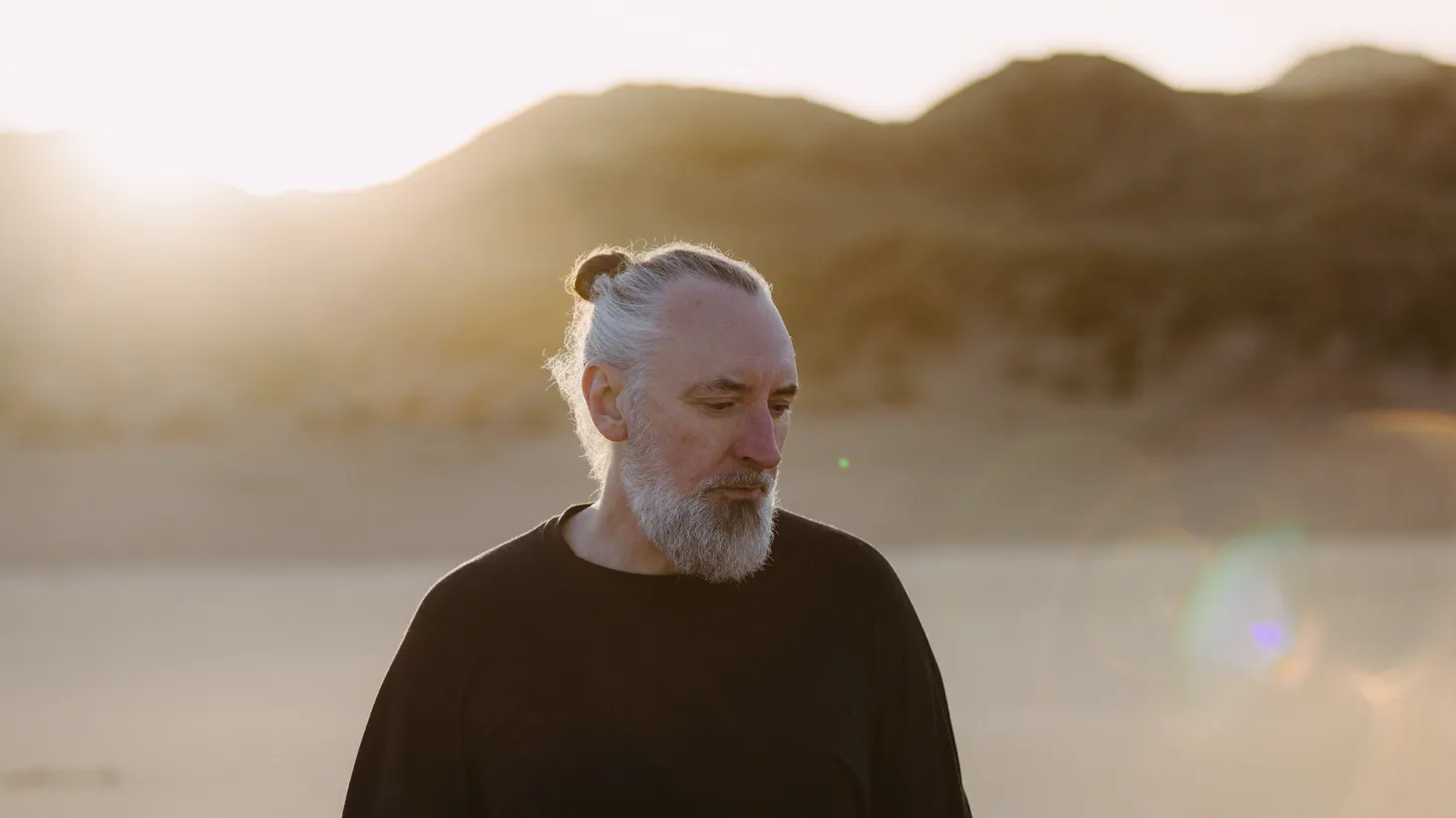 Singer-songwriter Fin Greenall, aka FINK , has been making audiences swoon for three decades. His eighth and latest album, Beauty In Your Wake, reunites the original power trio for electronic-inspired folk.