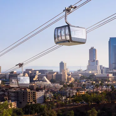 Conflict over a proposed aerial gondola to carry fans to and from Dodger Stadium is heating up. Is it a traffic solution or a dubious development plan?