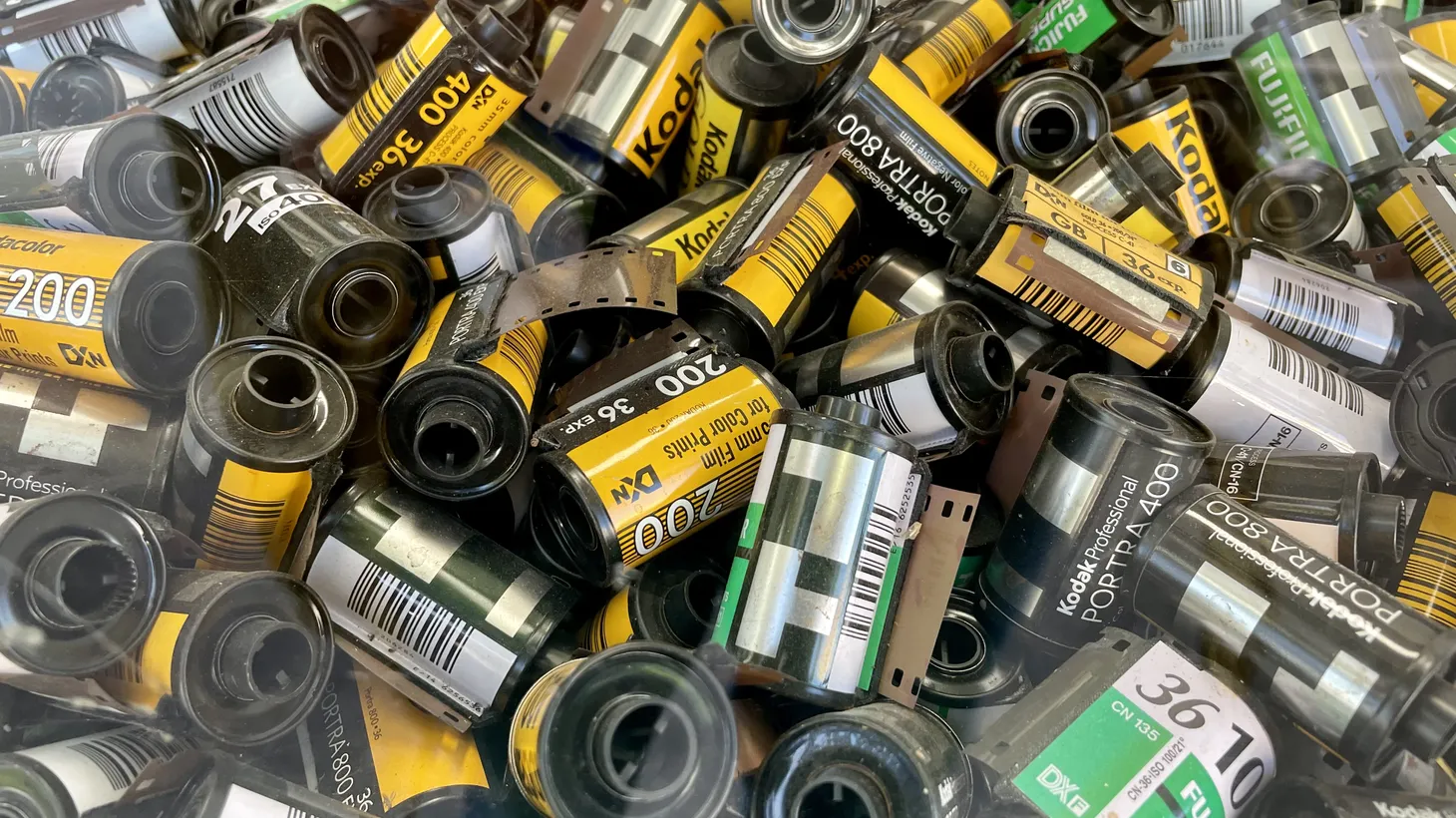 Empty 35mm film canisters fill a window display at J & F Photo Lab in Pico-Union. A growing number of people are interested in the analog medium.