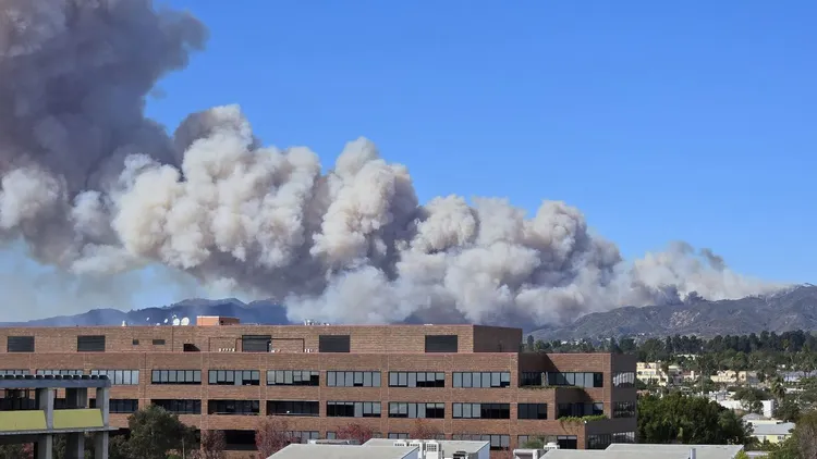 A life-threatening and destructive windstorm sparked at least two fires in SoCal on Tuesday, prompting evacuations and some power shut-offs.