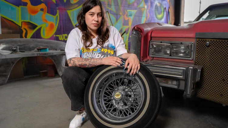 This East LA artist isn’t just painting lowriders, she’s carving out space for women in the male-dominated lowrider scene, turning car culture into fine art.