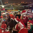 ‘Everyone has a little Santa in them’ at annual SantaCon