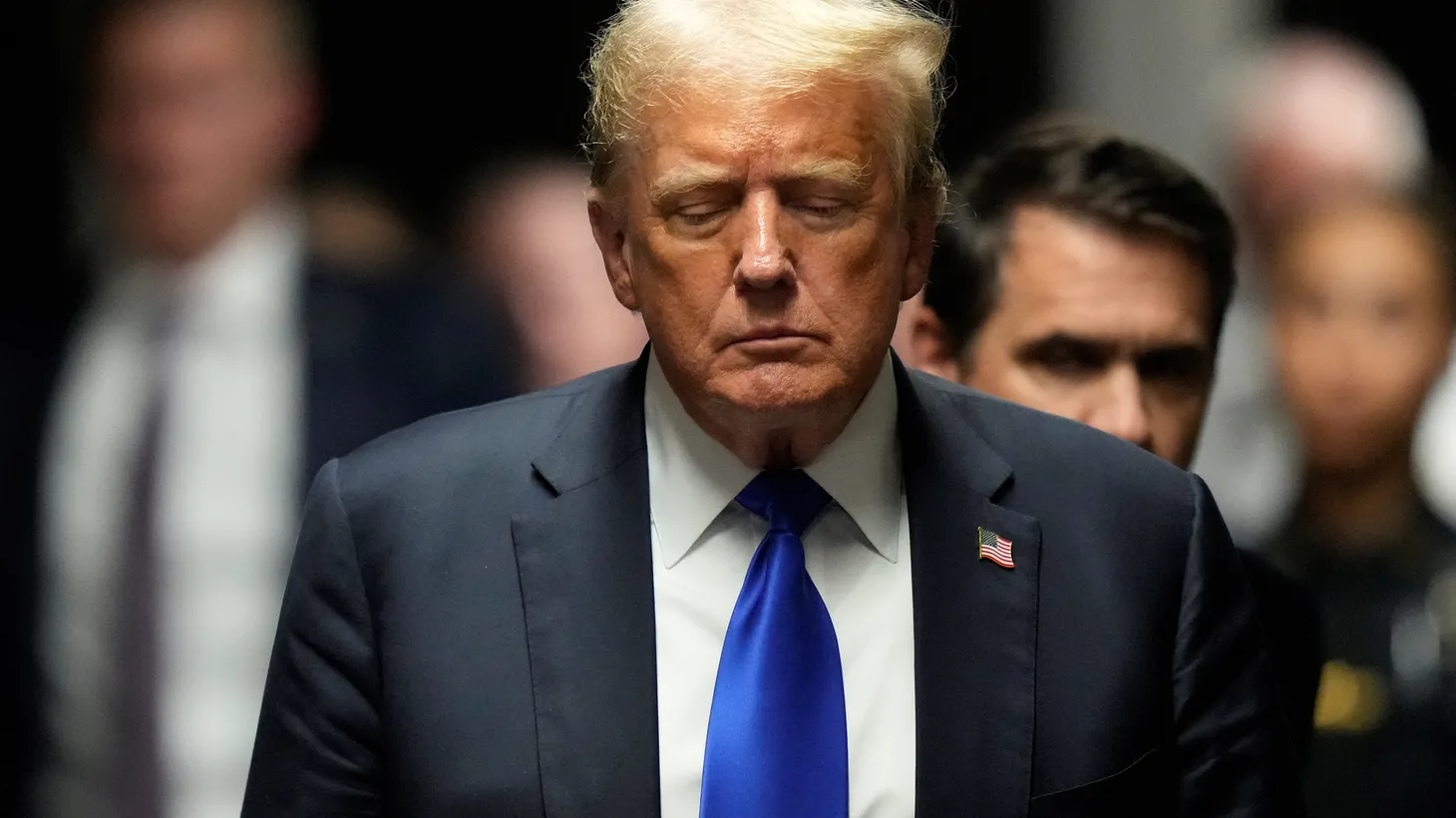 Donald Trump walks to make comments to the media after being found guilty on 34 felony counts at Manhattan Criminal Court, Thursday, May 30, 2024, in New York.