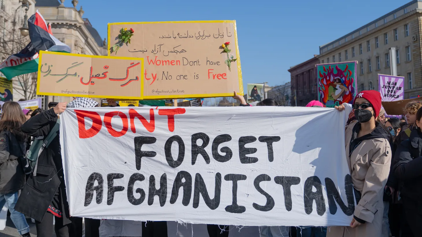 During a demonstration for International Women’s Rights Day, activists hold a banner saying, “Don’t forget Afghanistan,” in Berlin, Germany, March 8, 2024.