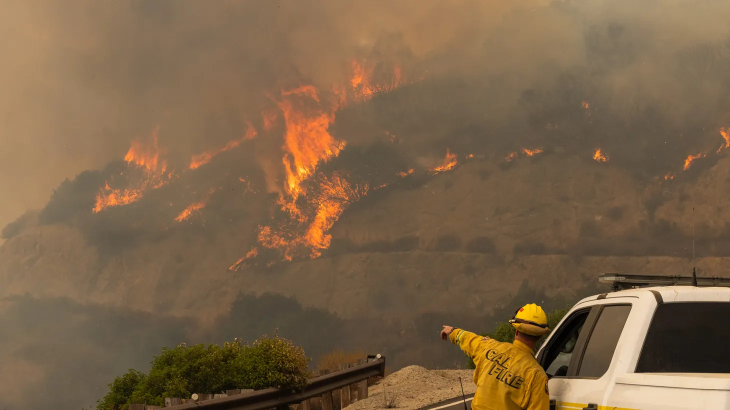 A firefighter works as the Line Fire grows in San Bernardino, California, September 7, 2024.