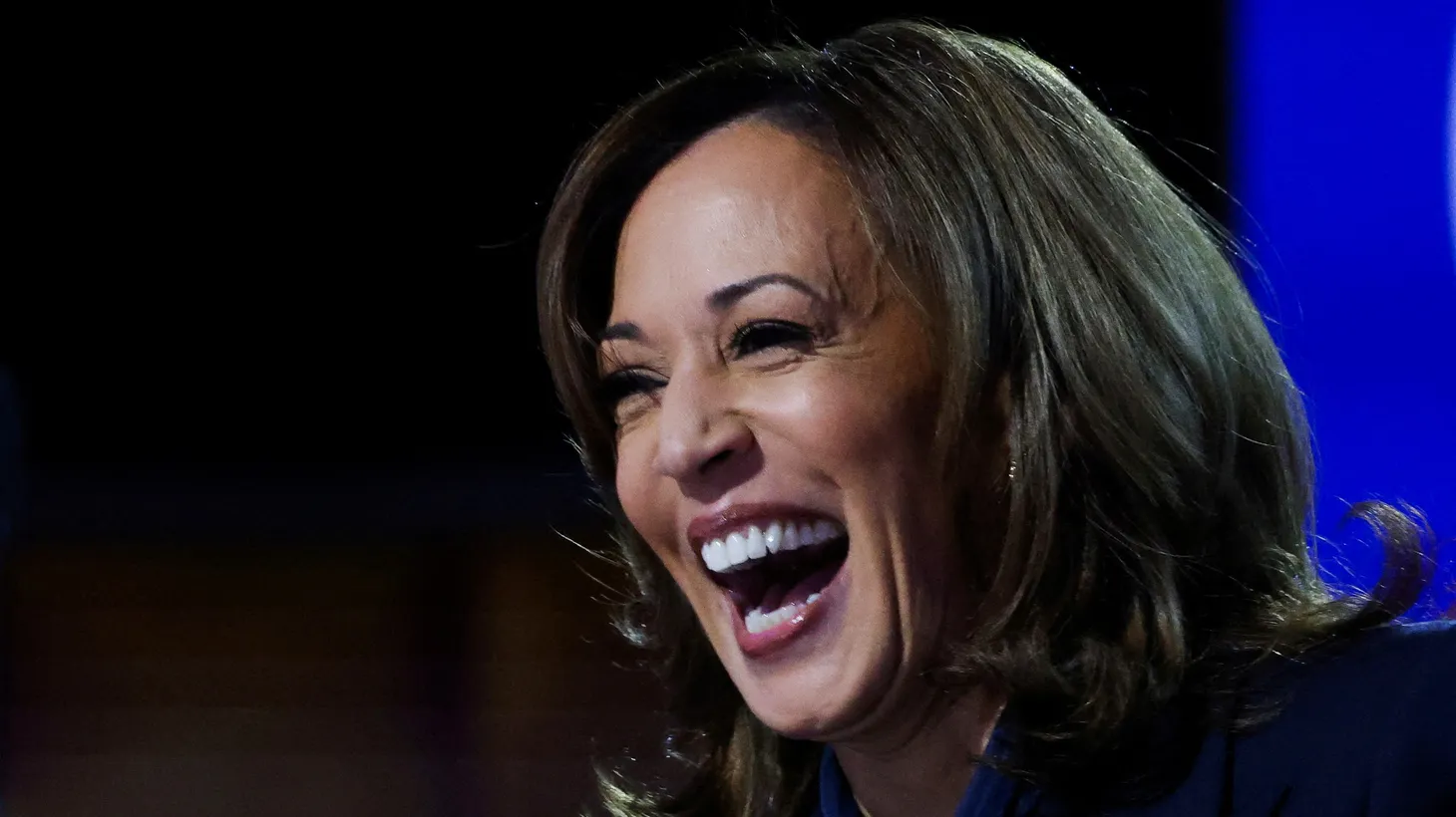 Democratic presidential nominee and U.S. Vice President Kamala Harris laughs on Day 4 of the Democratic National Convention (DNC) at the United Center in Chicago, Illinois, U.S., August 22, 2024.