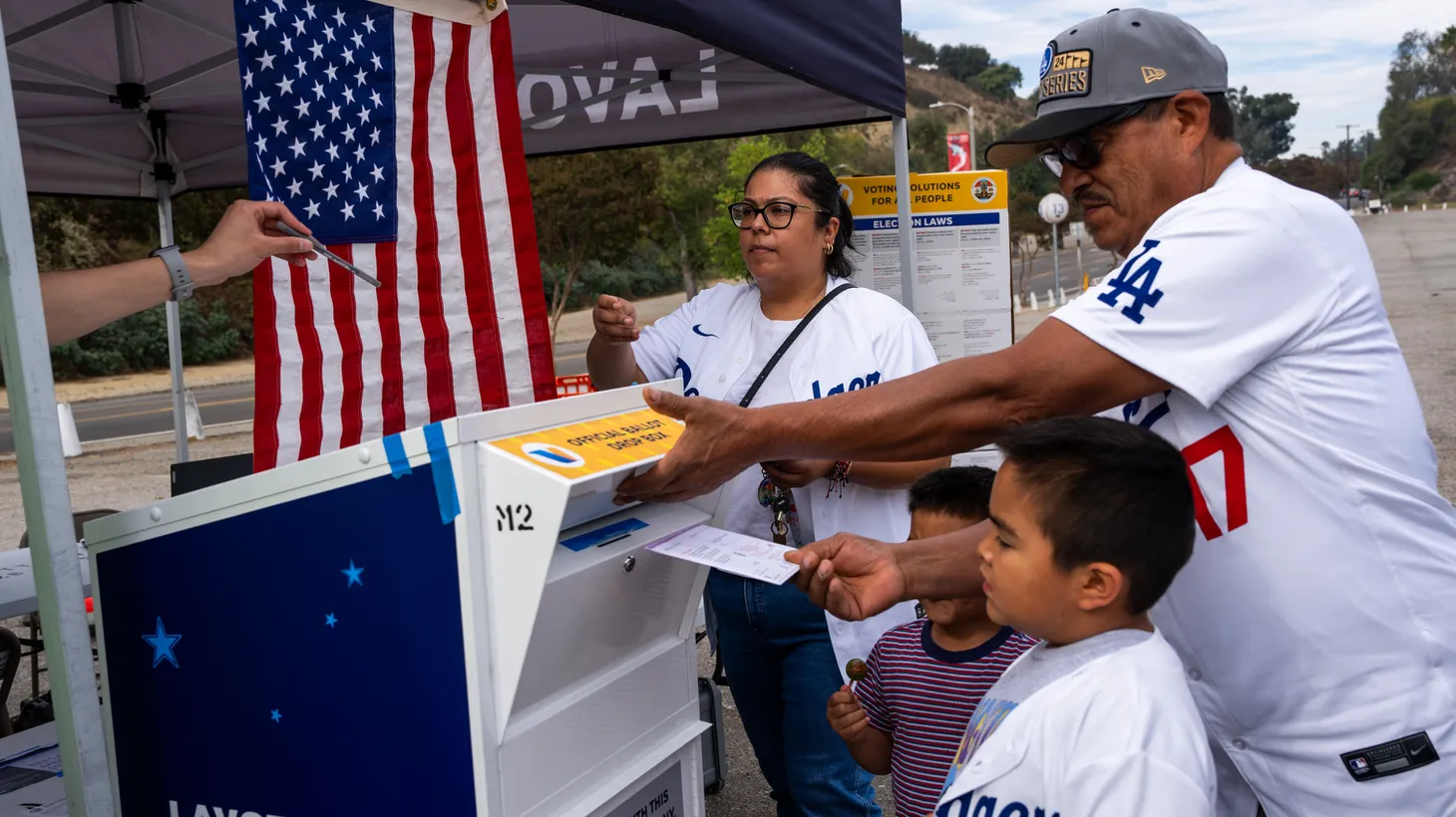 People cast their ballots during the early voting process at a polling station on October 27, 2024 in Los Angeles, California.