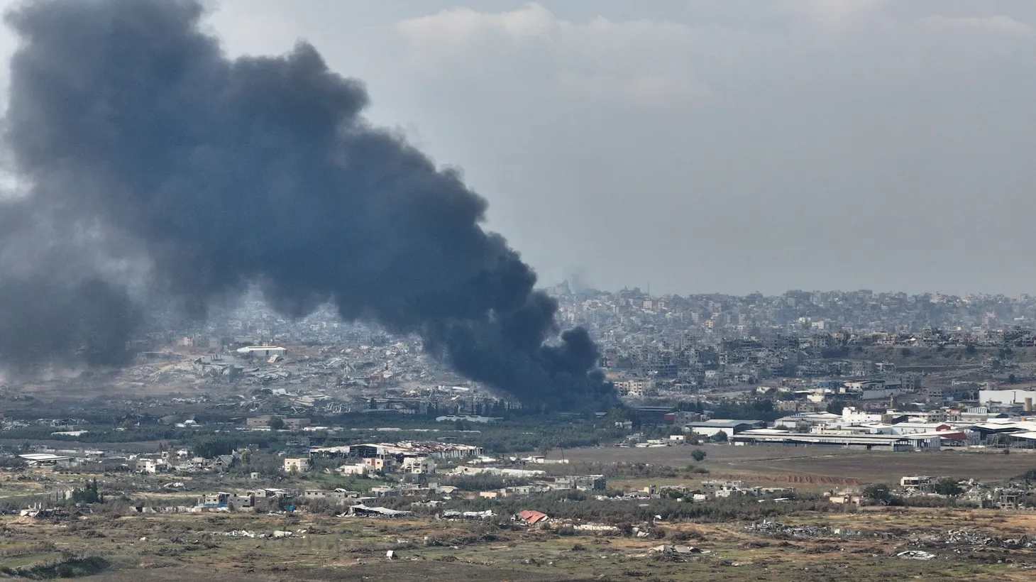 A drone view shows smoke above Beit Hanoun in the Gaza Strip, amid the ongoing conflict between Israel and Hamas, as seen from near Kibbutz Nir Am in southern Israel, December 12, 2024.