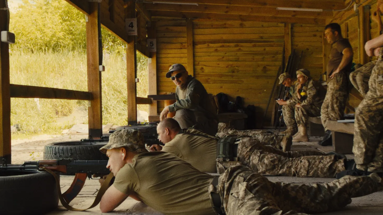 Slava Leontyev trains the civilian soldiers in “Porcelain War.”