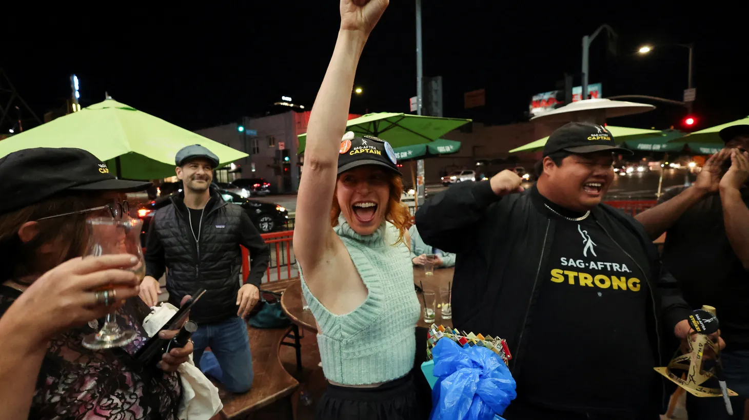 Keri Safran reacts next to union team captain Romel De Silva after the SAG-AFTRA TV/Theatrical Committee approved a tentative agreement with the Alliance of Motion Picture and Television Producers (AMPTP) to end the 118-day actors’ strike, at a brewery in Los Angeles, California,. U.S. November 8, 2023.