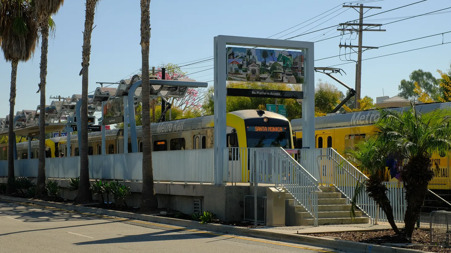 Metro rail trains are seen at Exposition Blvd. and Vermont Ave., Los Angeles, CA.