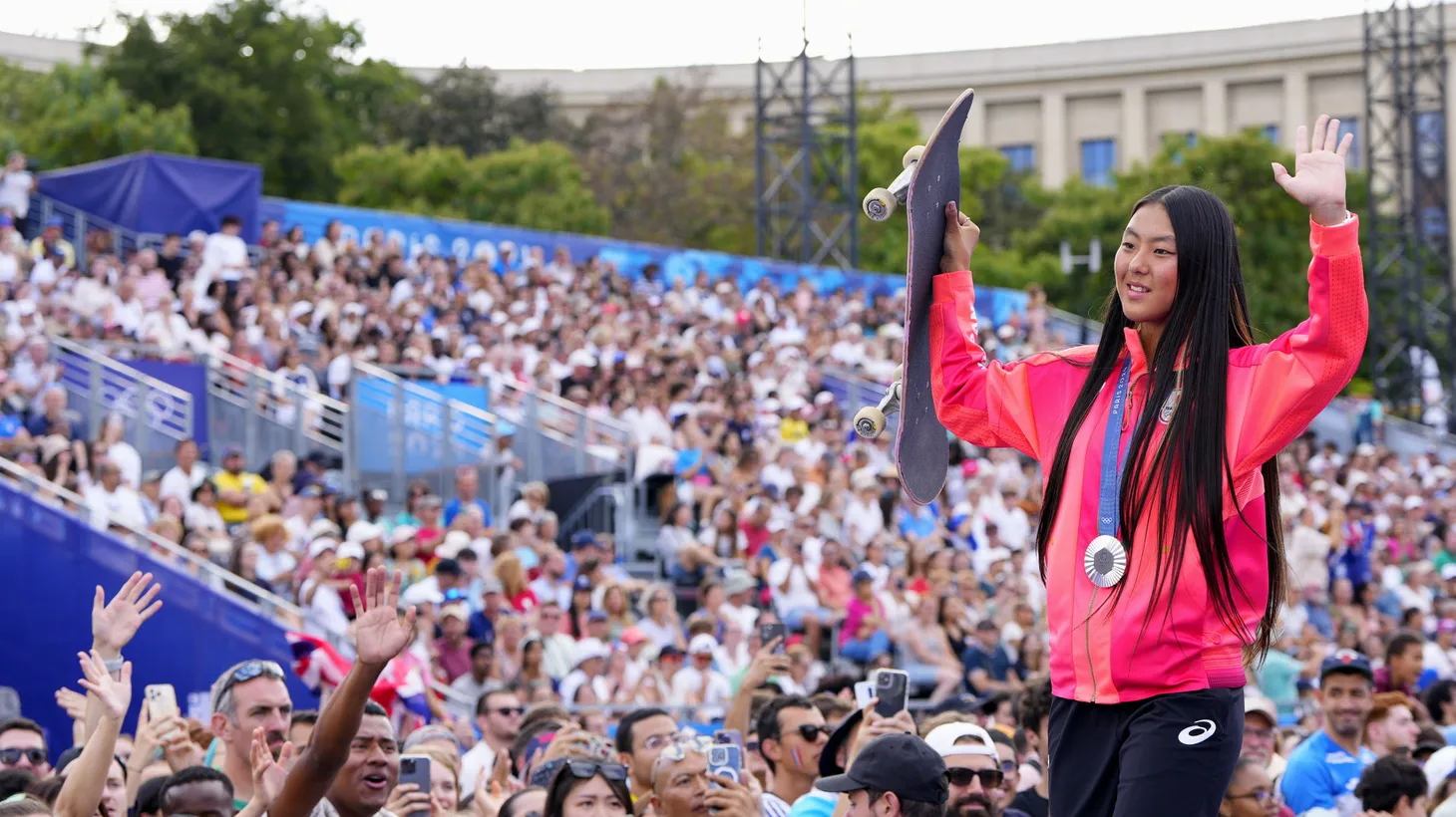 Skateboarding women's park silver medalist Cocona Hiraki of Japan acknowledges the crowd at the Paris Olympics Champions Park on Aug. 7, 2024.