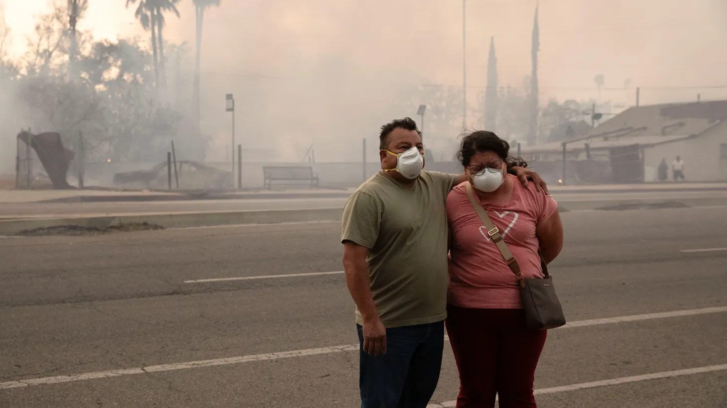 Caroline Ramirez reacts as she watches her home being affected by the Eaton Fire in Altadena, California, U.S. January 8, 2025.