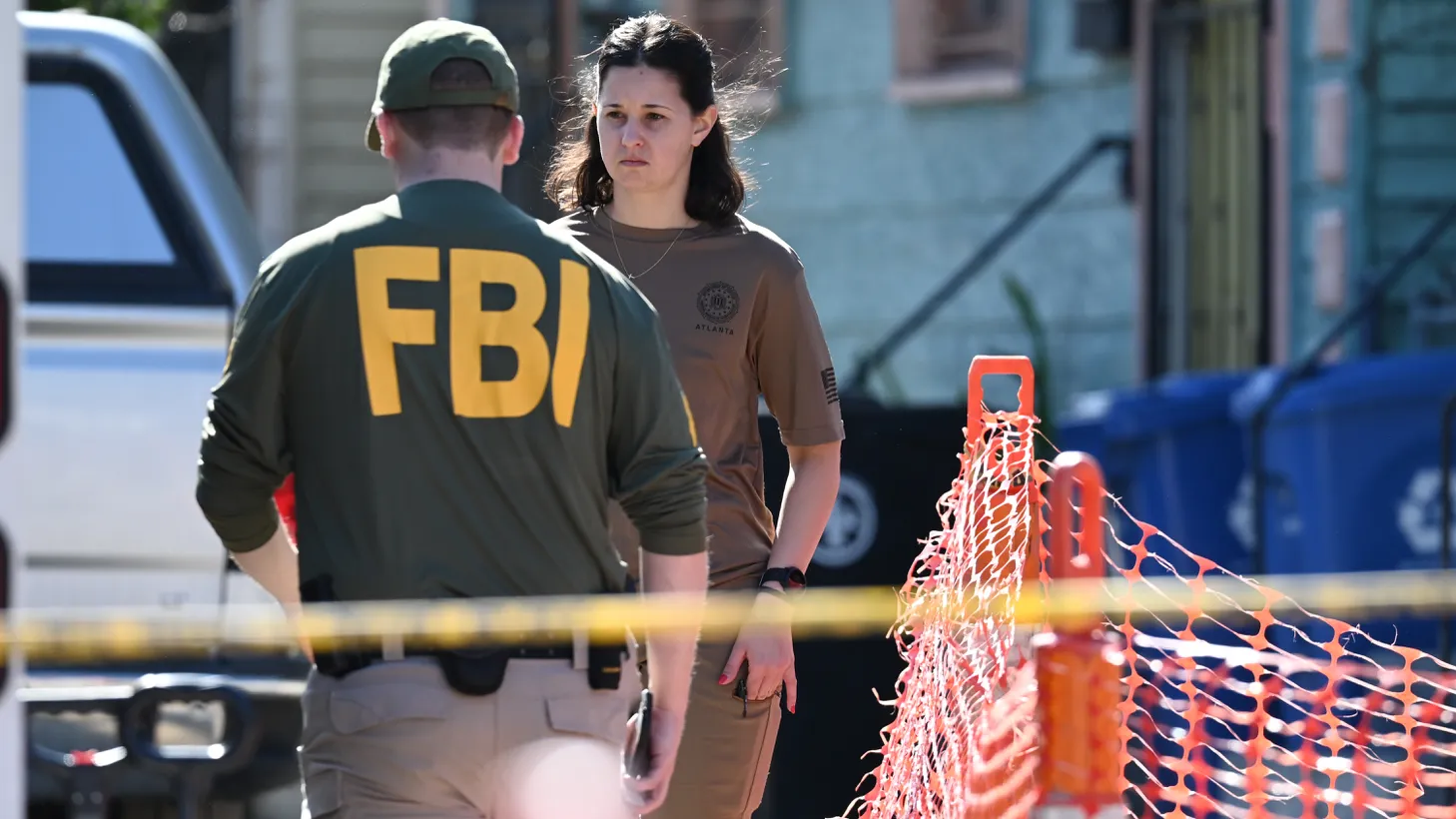 Police, ATF, and FBI agents are outside a house where a fire occurred on Mandeville Street, which is connected to the mass casualty Bourbon Street terrorist attack in New Orleans, Louisiana, on January 2, 2025. Bomb-making materials are found inside the residence.