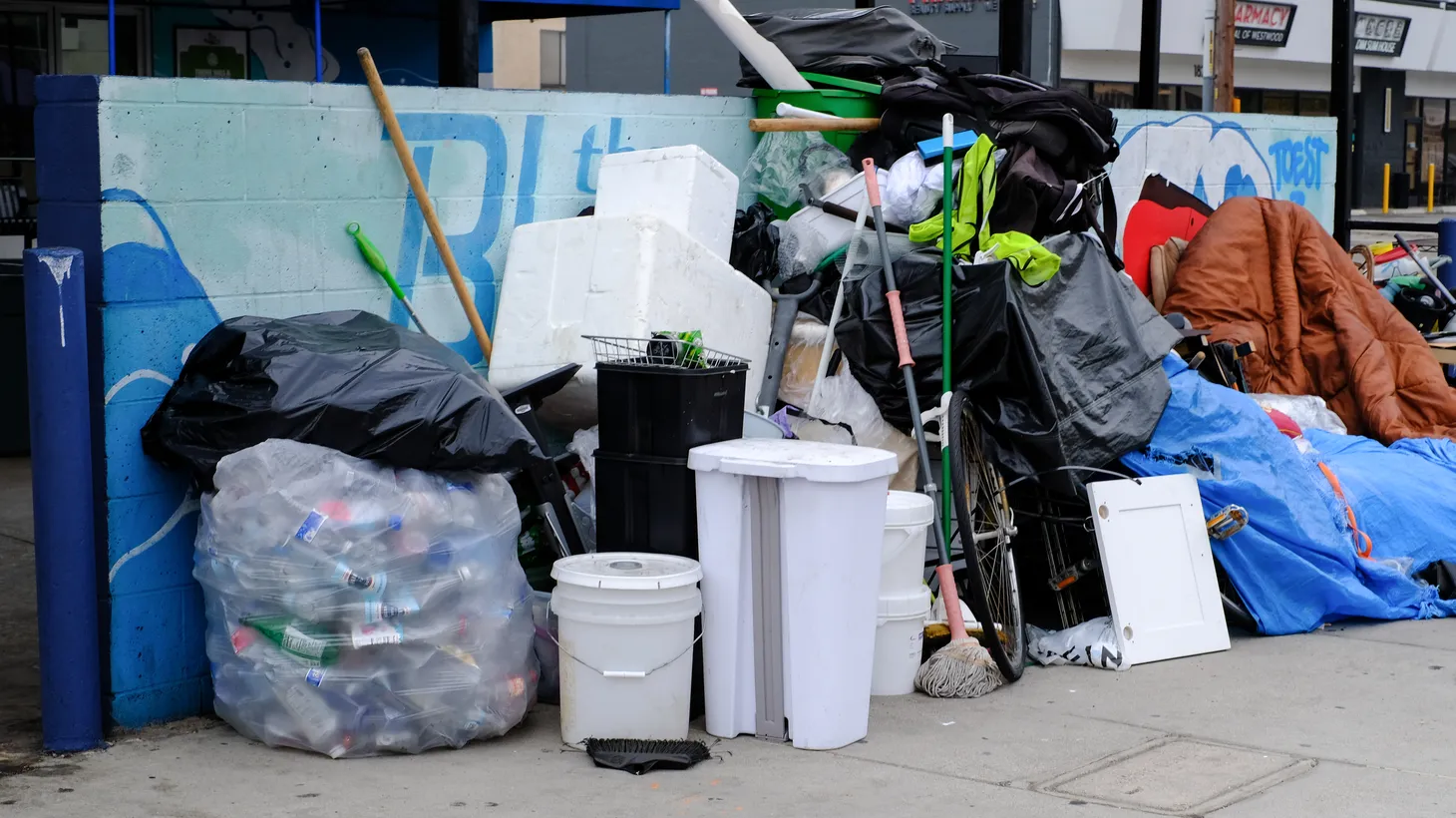 Items from a homeless encampment are seen in Westwood, Los Angeles.