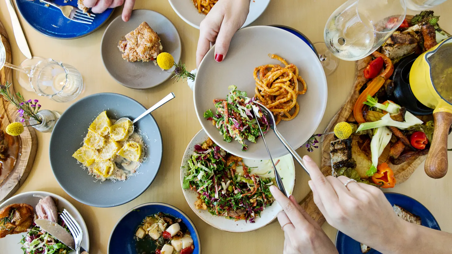 Customers enjoy a diverse spread of dishes from Alimento.